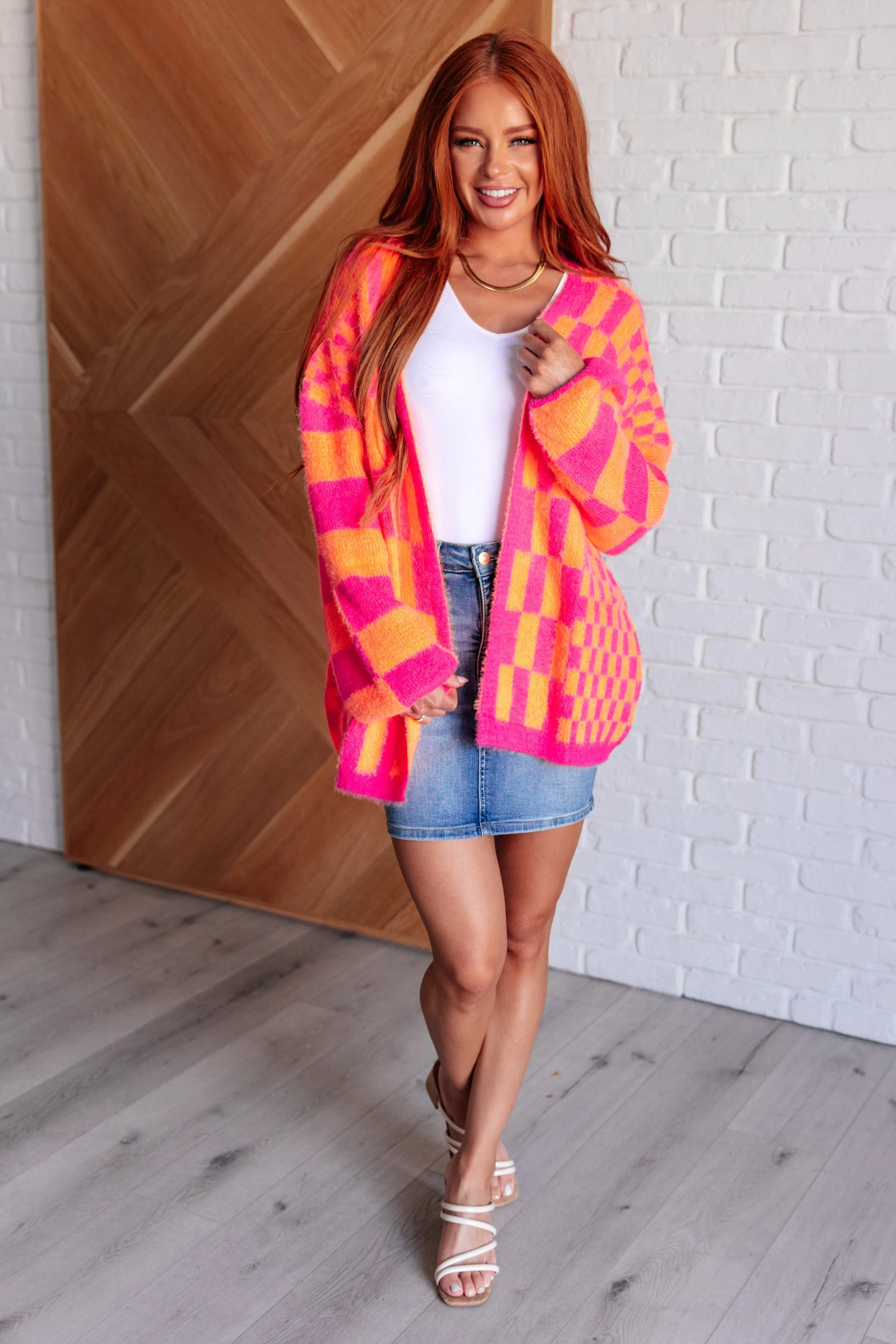 Noticed in Neon Checkered Cardigan in Pink and Orange - 10/21